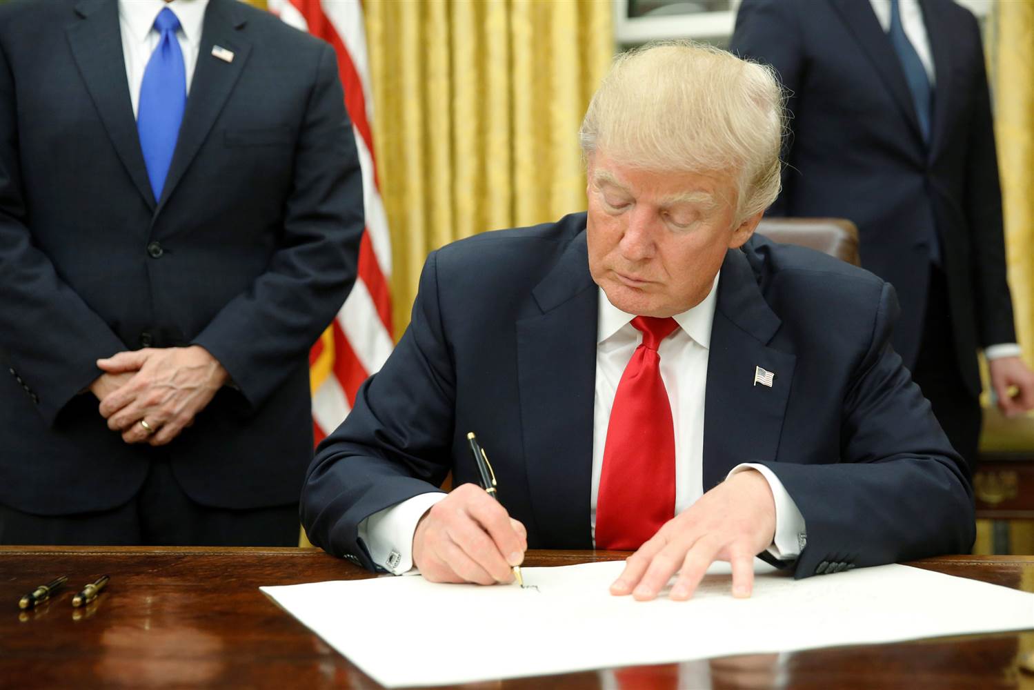 Trump Signing the Executive Order